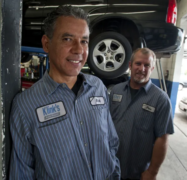 Carlos Klink and Pete in the shop at Klink's & Tito's Automotive